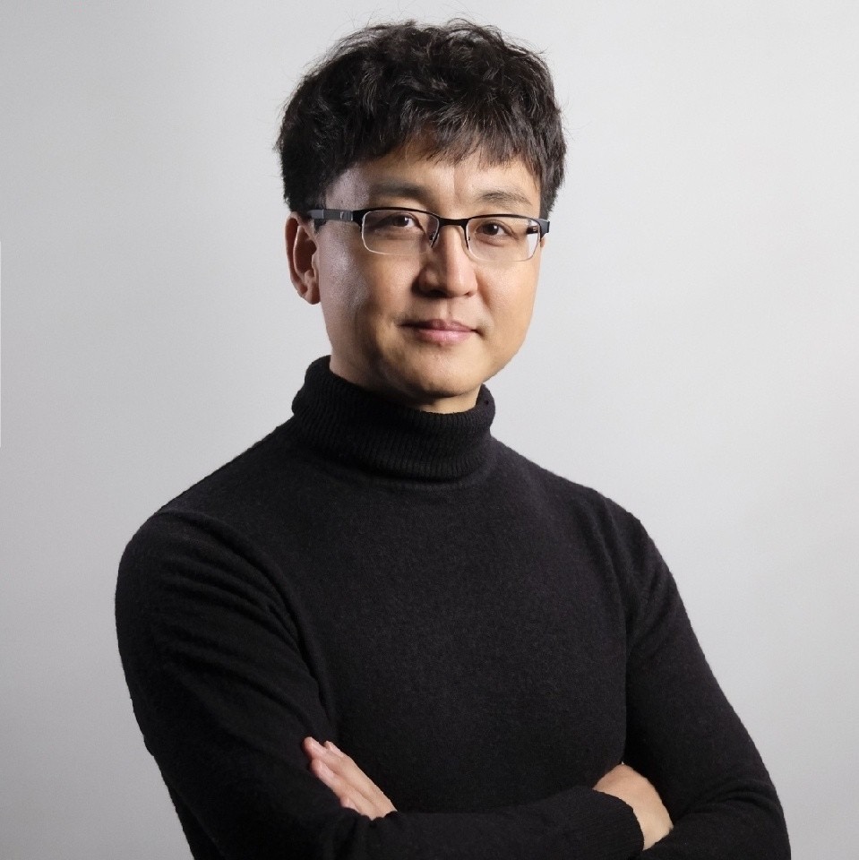 Portrait de Xiangdong HU, fondateur du Groupe HXD